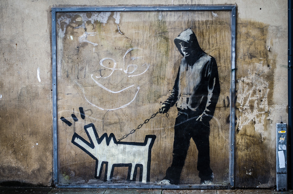 Choose your weapon dog by Banksy 