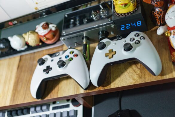 white xbox one controllers on table